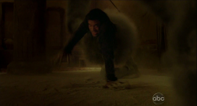 File:6x01 Monster grab.png