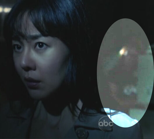 File:Woman-behind-sun.jpg