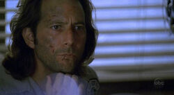 2x23 DesmondWatchingFilm.jpg
