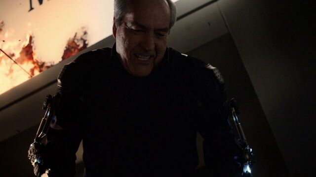 File:Malick-EvilLaugh-SuperSuit.jpg