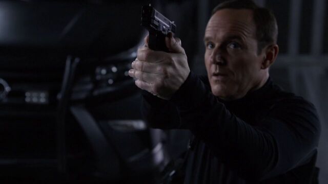 File:Phil-Coulson-Bus-Aims-Gun-Skye.jpg