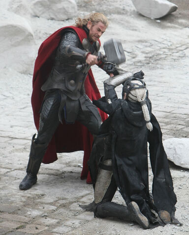 File:Thor-dark-world-chris-hemsworth-hitting-christopher-eccleston-malekith.jpg