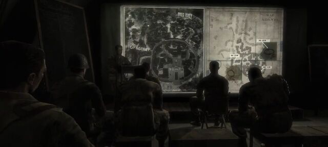 File:Travers at briefing.jpg