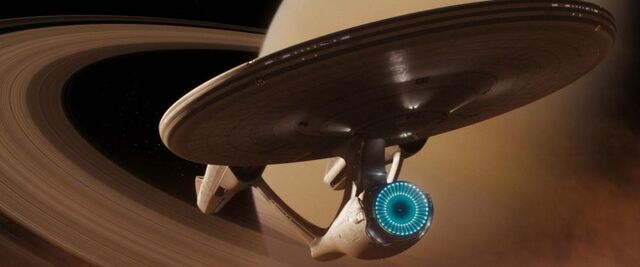 Файл:1000px-USS Enterprise (alternate reality) hides in Saturn's rings.jpg