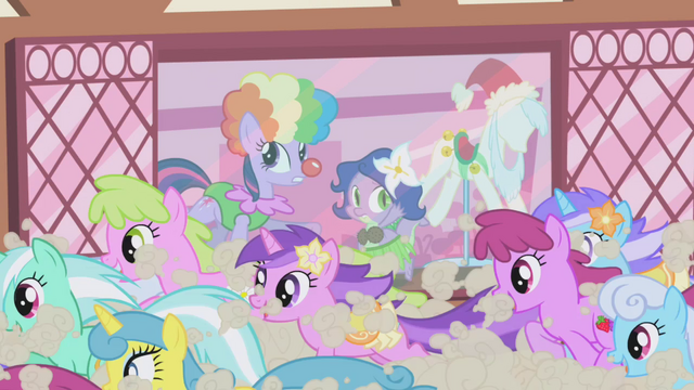 File:Ponies run past costume shop S1E3.png