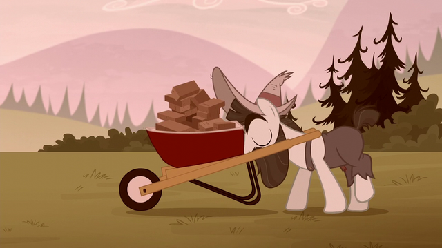 File:Piles McColt pushing a wheelbarrow of bricks S5E23.png