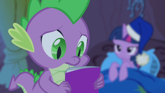 File:Spike looking at comic disappointedly S4E06.png