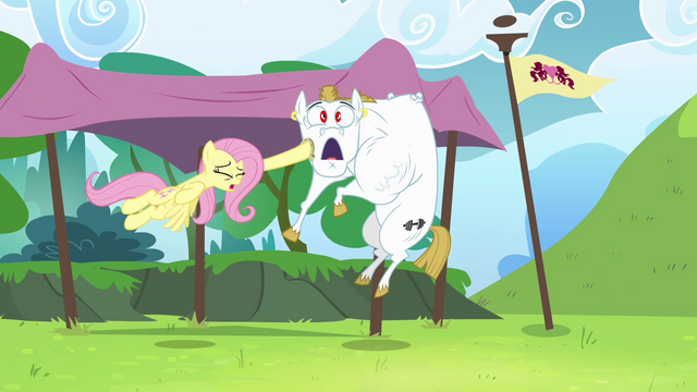 File:Fluttershy hits Bulk with horseshoe S4E10.png