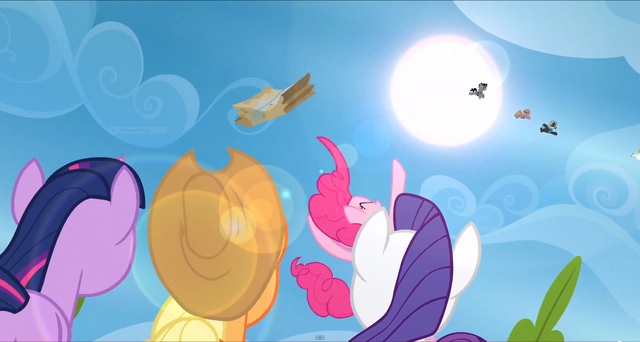 File:Pinkie Pie throws the care package into the air S3E7.png