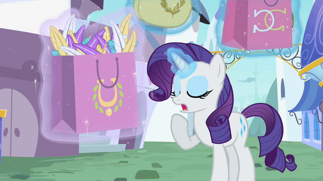 File:Rarity taking control of the bag S02E09.png