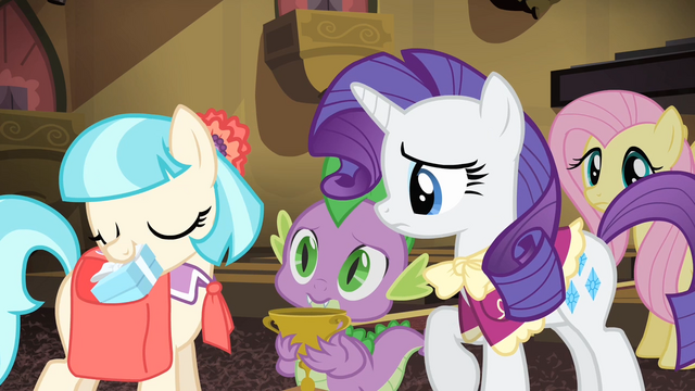 File:Coco pulls a box out of her saddlebag S4E08.png