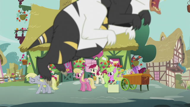 File:The Flower ponies look at Derpy while a bugbear is flying S5E9.png