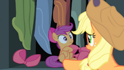 Applejack sees Scootaloo inside cupboard S4E17.png