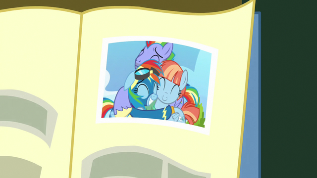 File:Photo of Rainbow hugging her parents S7E7.png