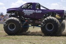 15583909-Monster-Truck-at-Car-Show-Stock-Photo-monster