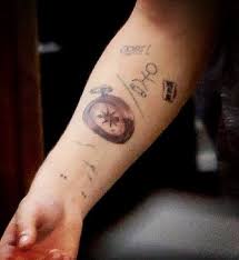 File:Louis tattoos.jpg