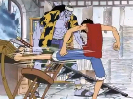 Luffy destruyendo la habitación de Nami