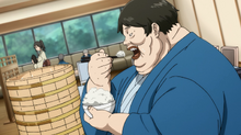 Pig God eating rice