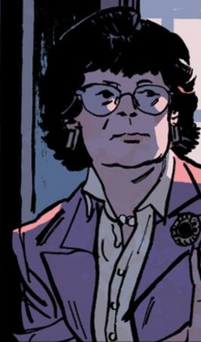 Smartly dressed middle aged woman