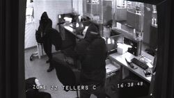 1x03 ReviewingRobbery.jpg