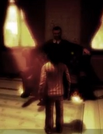 Lucifer (sitting down)