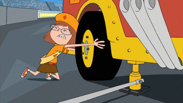 File:Gretchen changes a tire.jpg