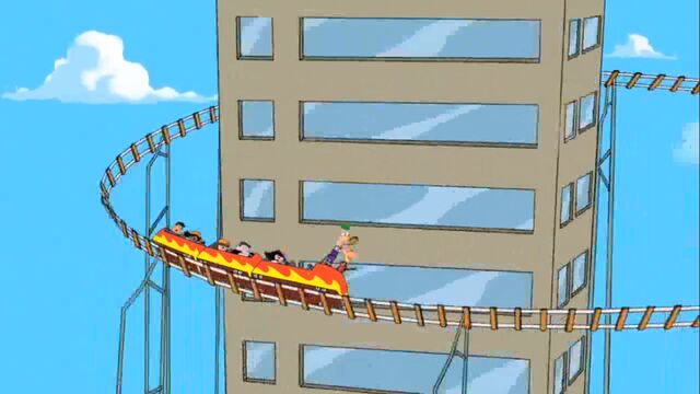 File:Coaster spinning around building.jpg