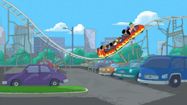 File:Coaster in parking lot.jpg
