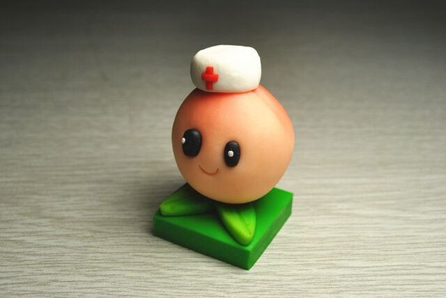 File:CostumedHeavenlyPeachFigure.jpg