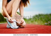 Stock-photo-runner-trying-running-shoes-getting-ready-for-jogging-105675941