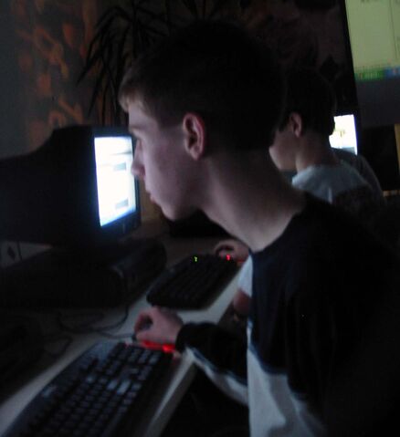File:Computer users in dark lab.jpg