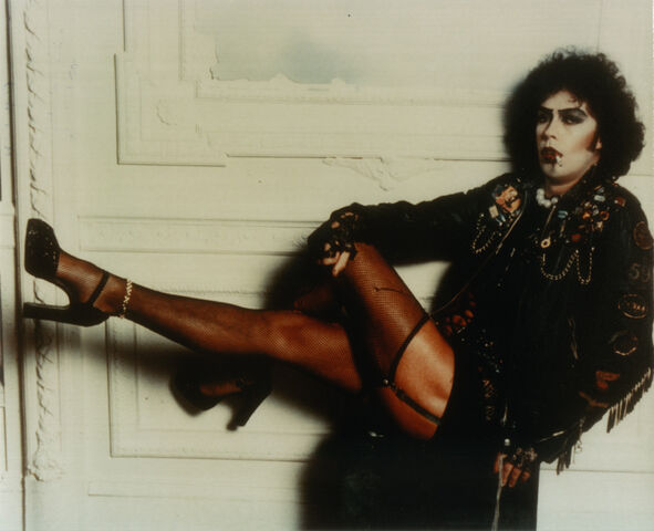 File:RHPS-FrankReclineOnBox.jpg