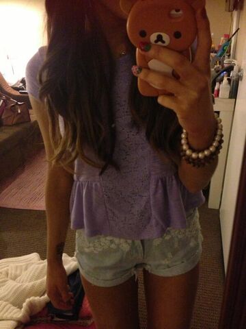File:Ariana wearing Cat's shirt May 6, 2013.jpg