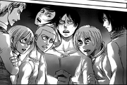 Eren lee las instrucciones de Erwin