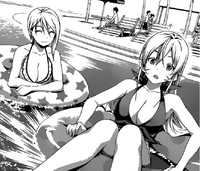 Alice and Erina poolside