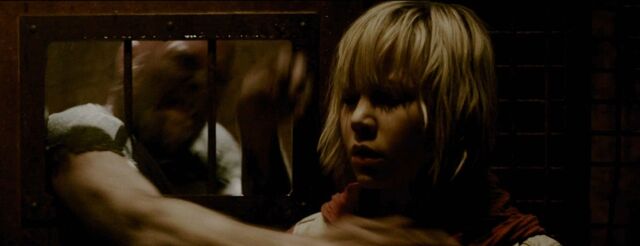 File:Heather getting attacked by an inmate.jpg