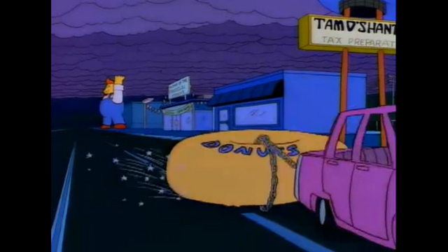 File:HomerMakesOffWithLardLadsCollosalDonut.png