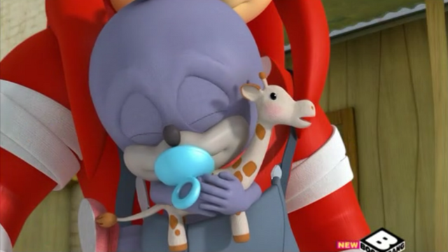 File:Chumley holding toy giraffe.png