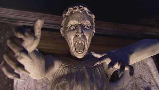 File:Angel bares fangs.jpg