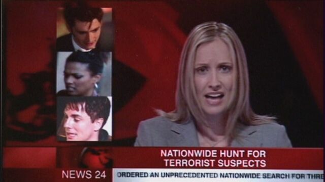 File:Newsreader sound of drums.jpg
