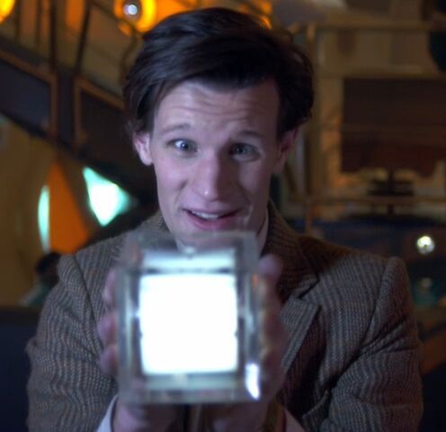 File:Eleventh-doctor-holds-hypercube.jpg
