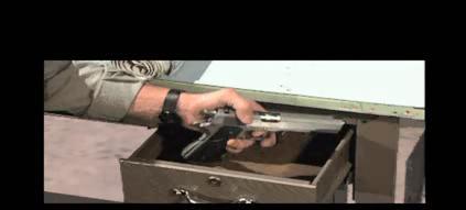 File:Malloy gets gun.jpg