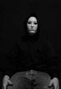 Man in white mask