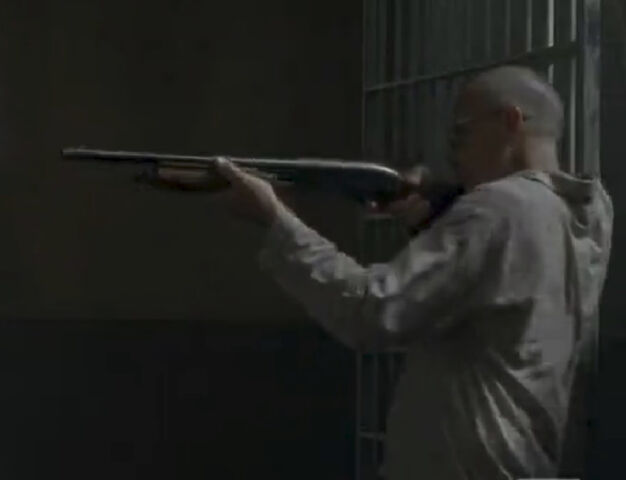 File:Woodburyextra40withshotgun (infected).jpg