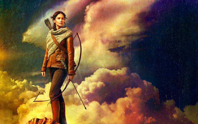 Archivo:Katniss-stand-poster-1024x641.png