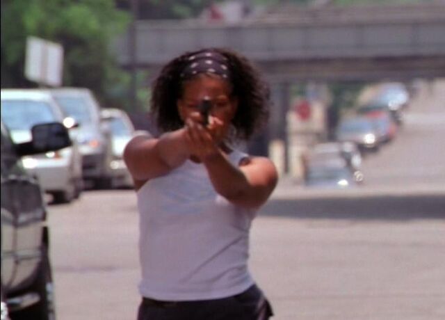 File:Omar's Gun Moll Kimmy.jpg