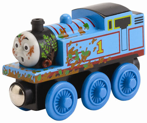 File:WoodenRailwayMudCoveredThomas.jpg