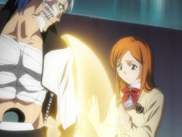 File:Orihime heals Grimmjow.jpg