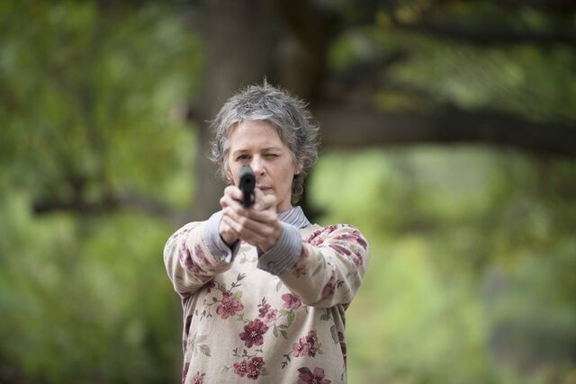 File:Carol aims gun.jpg