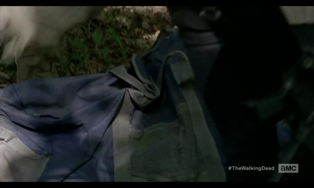 File:5x02 Bag Of Guns.png